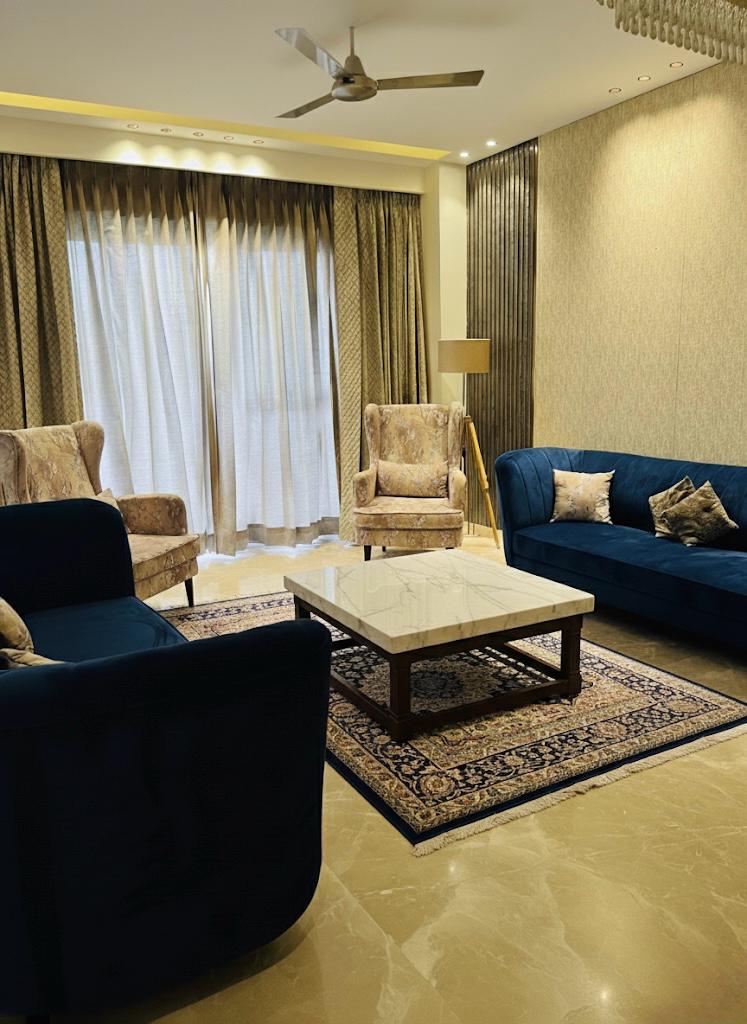 Luxury living room interior design with blue velvet sofas, marble coffee table and designer lighting by Assankhhya